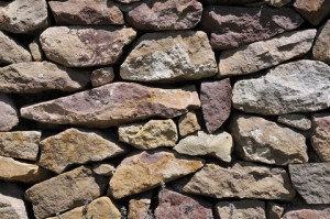A rock wall is made from a firm foundation
